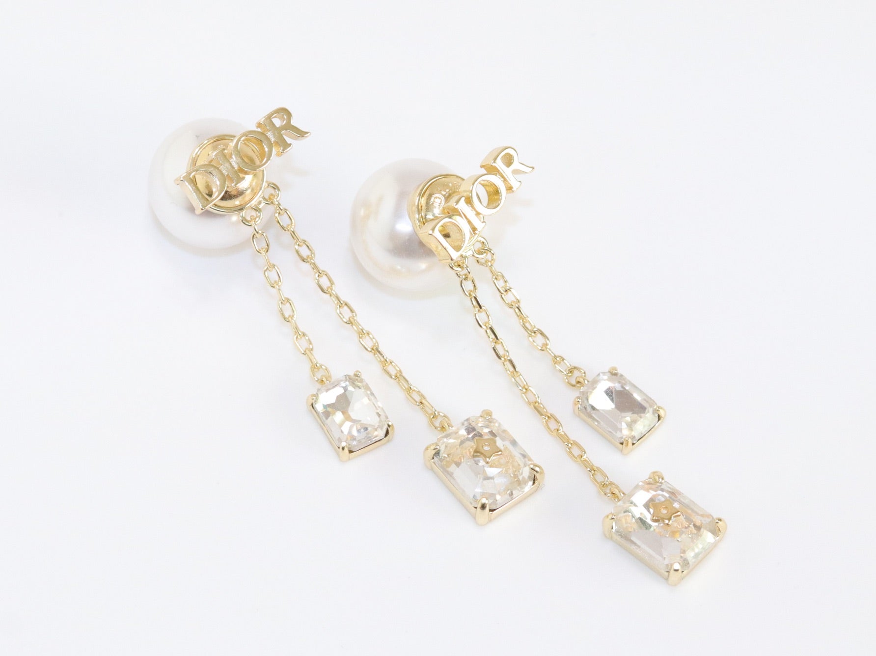 Alphabet C and D dangling pearl studs with CZ