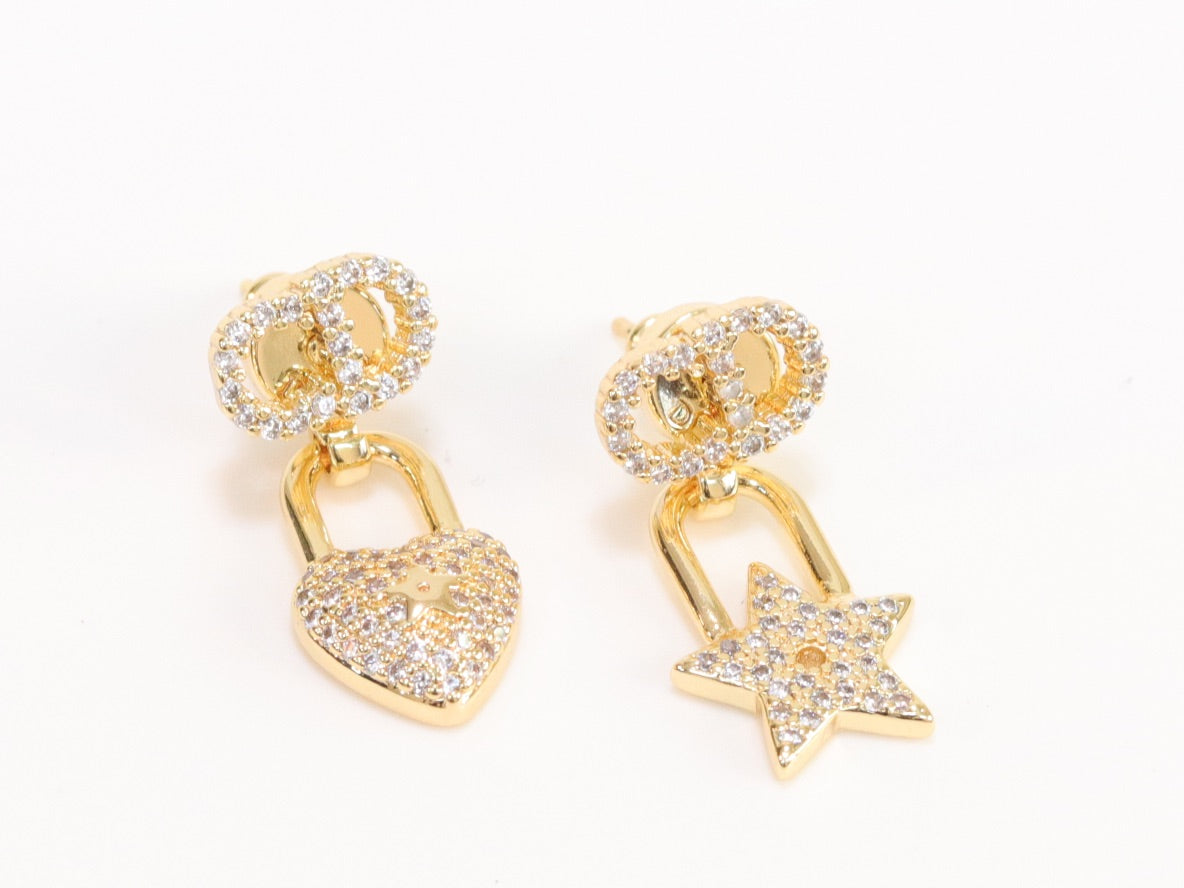 Alphabet C and D lock and star dangling stud in gold finish with cz