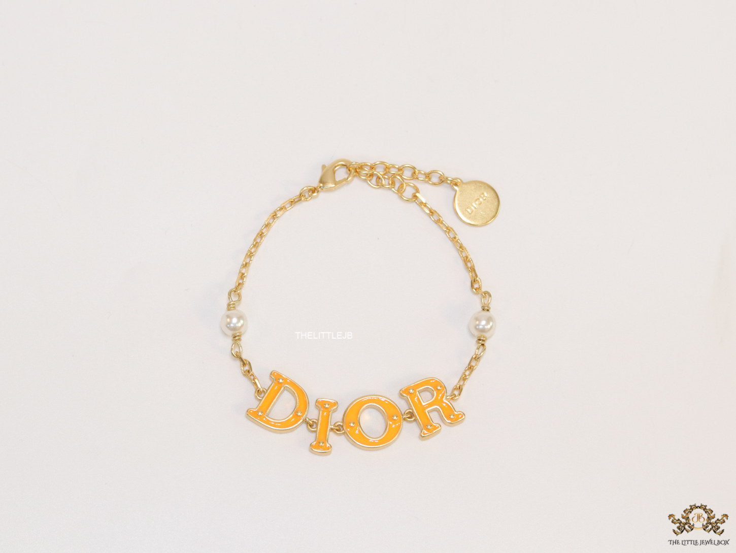 Alphabet bracelet with gold plated chain