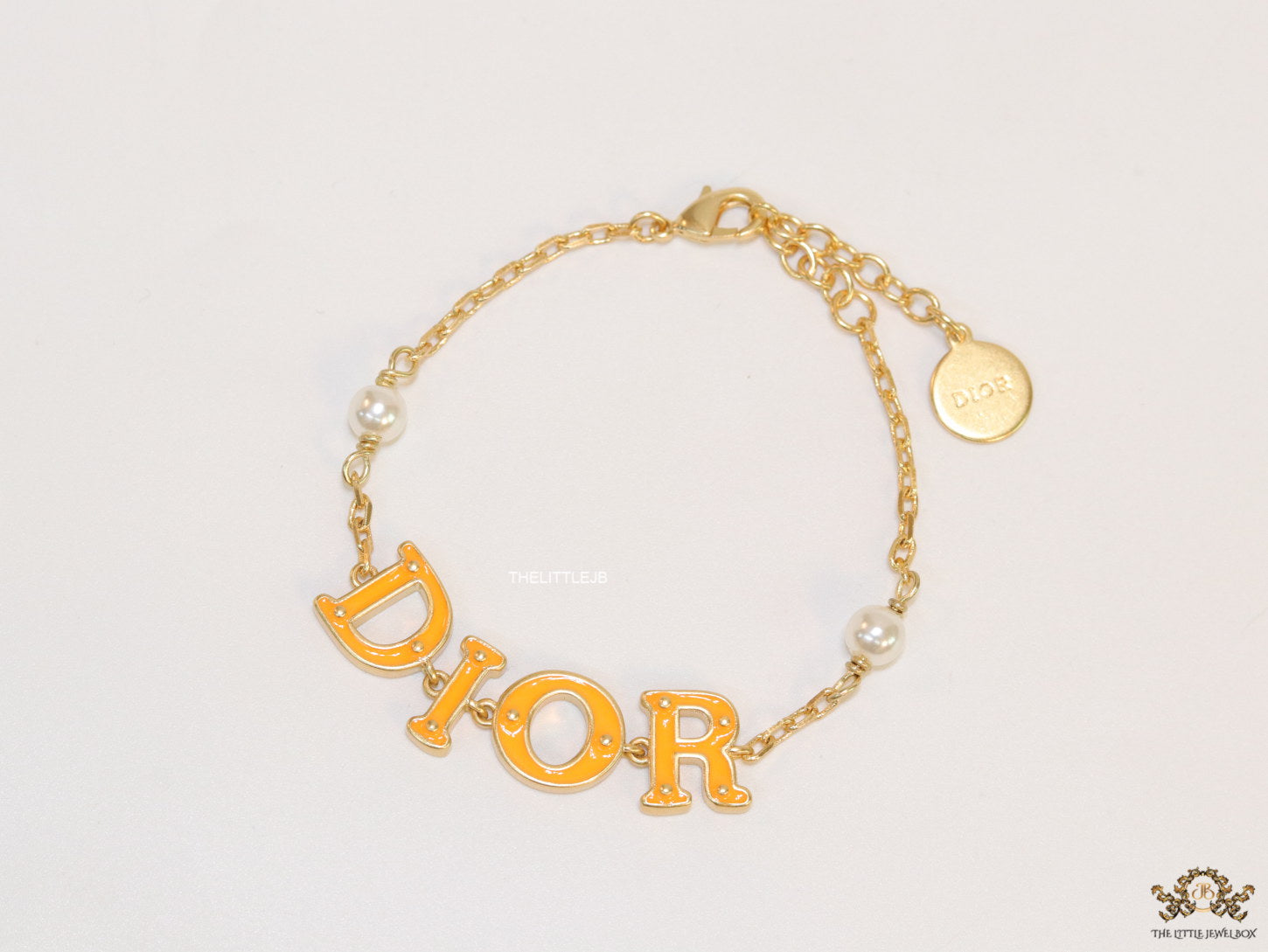 Alphabet bracelet with gold plated chain