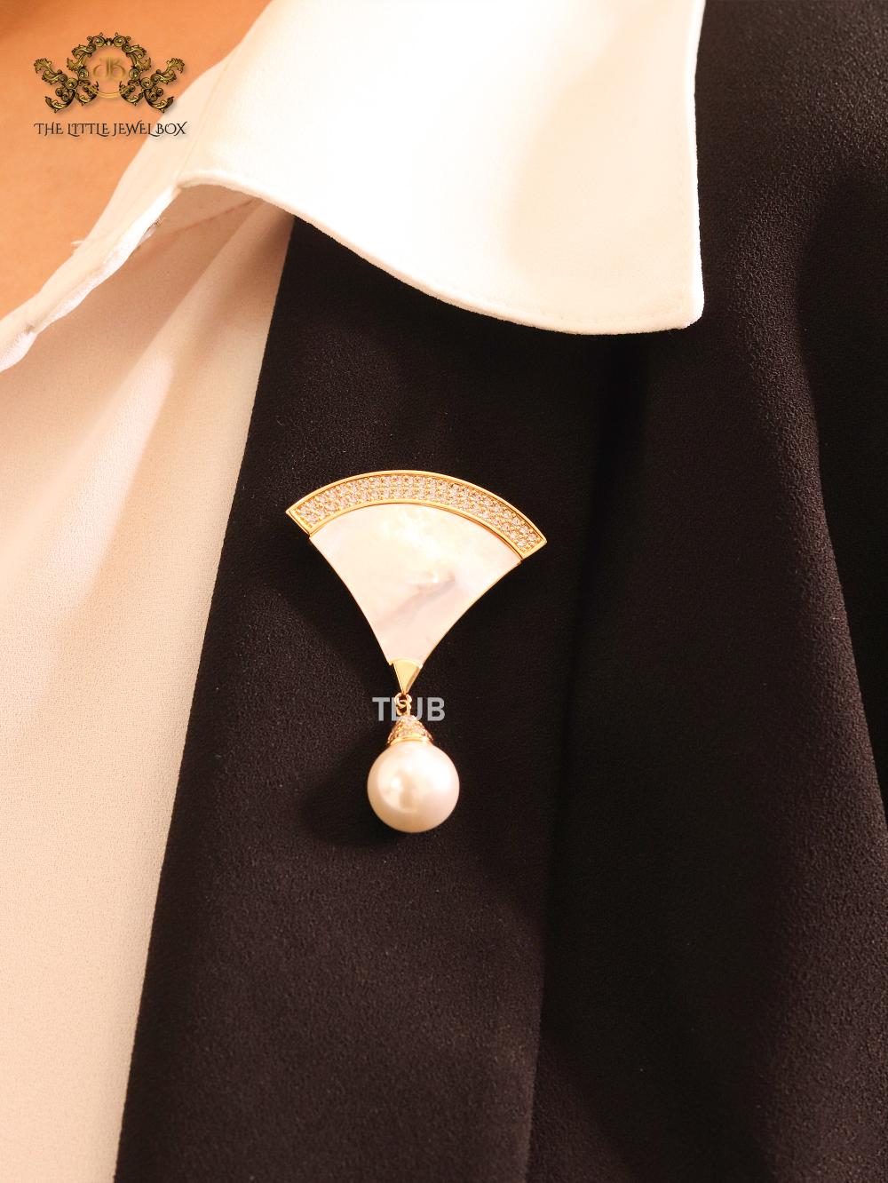 White enamel brooch with pearl