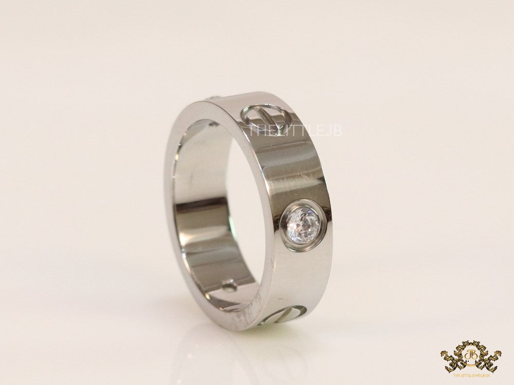 Broad 6mm platinum plated band with screws and stones