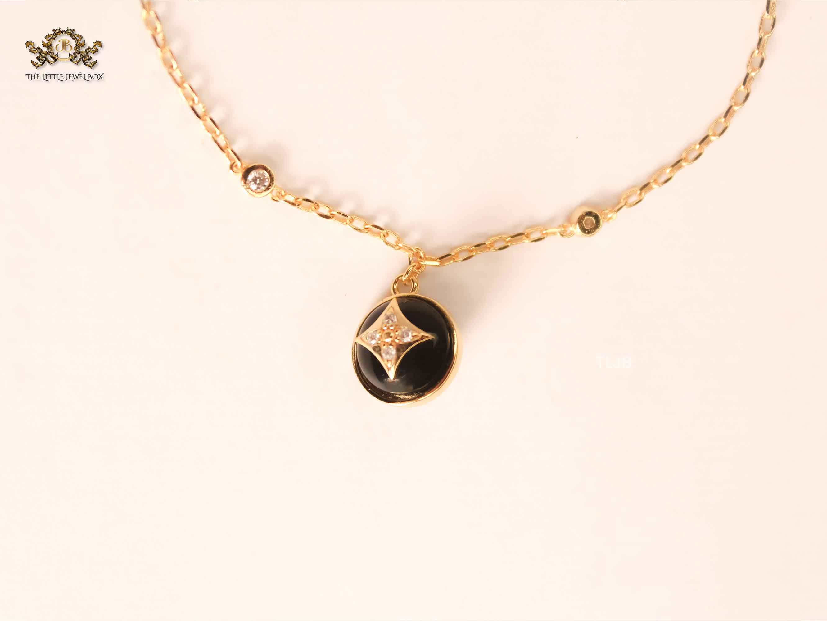 Alphabet L & V Lunar Charm black bracelet