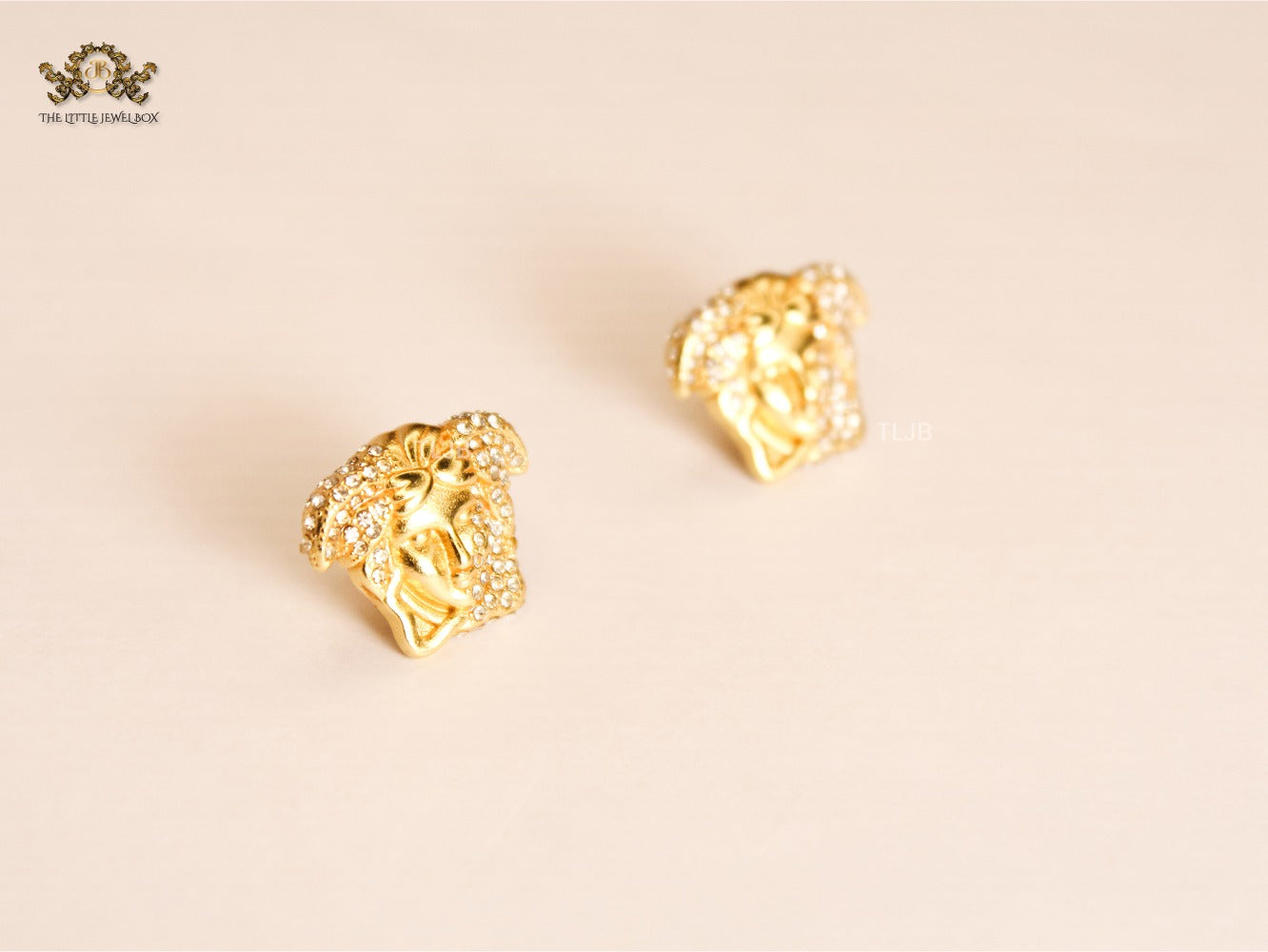 Divine Gold Medusa earrings with cz