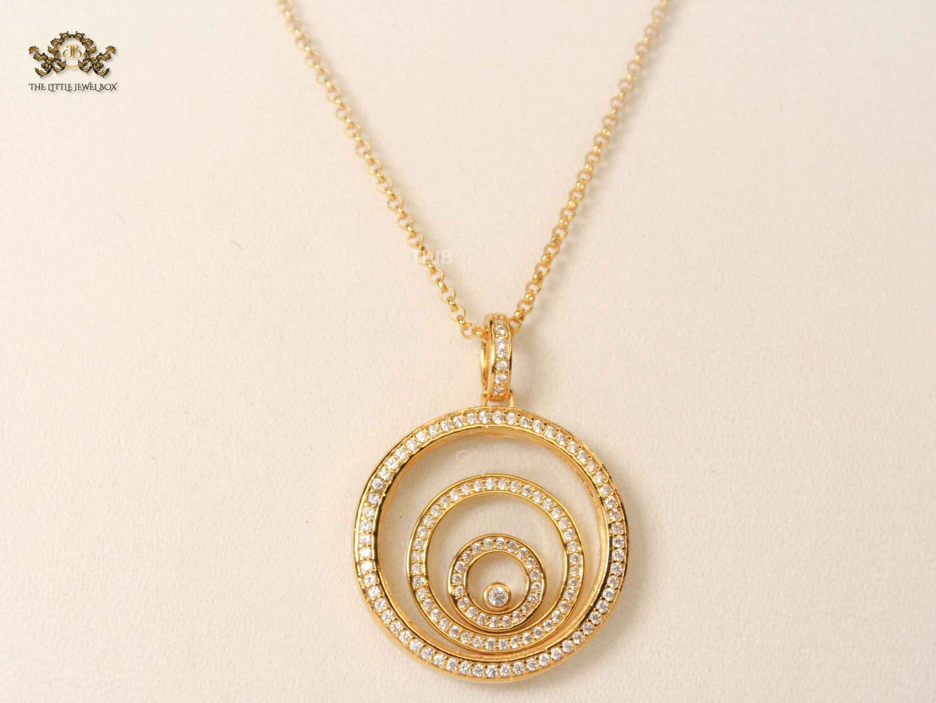 gold swirl necklace CHPRD