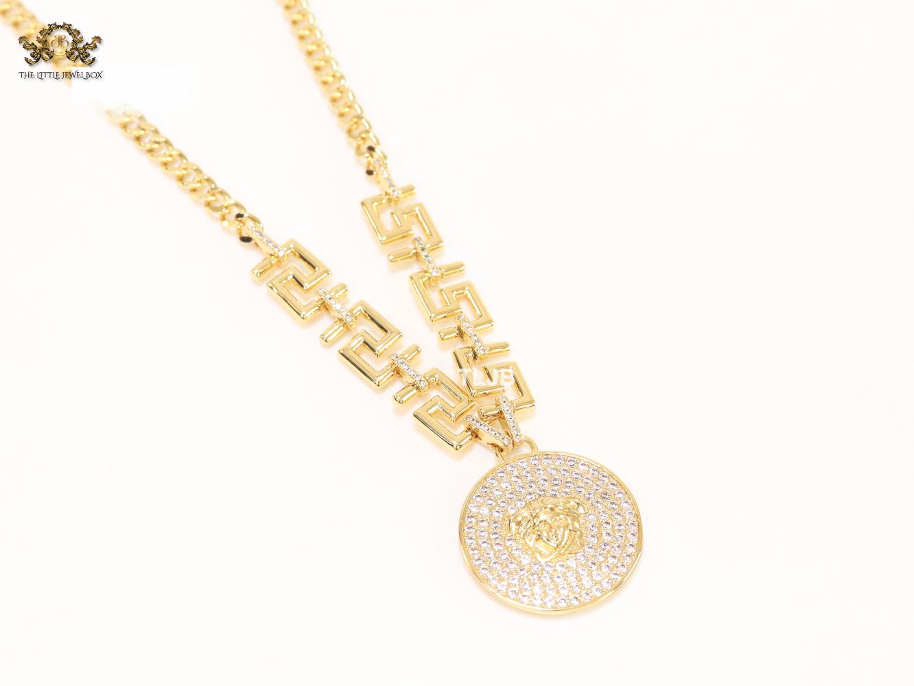 Medusa round pendant with gold link chain