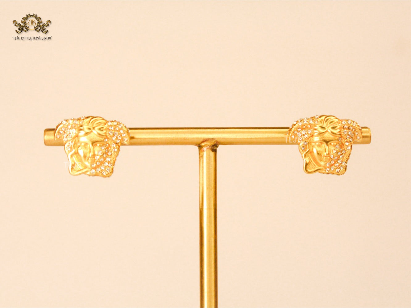 Divine Gold Medusa earrings with cz