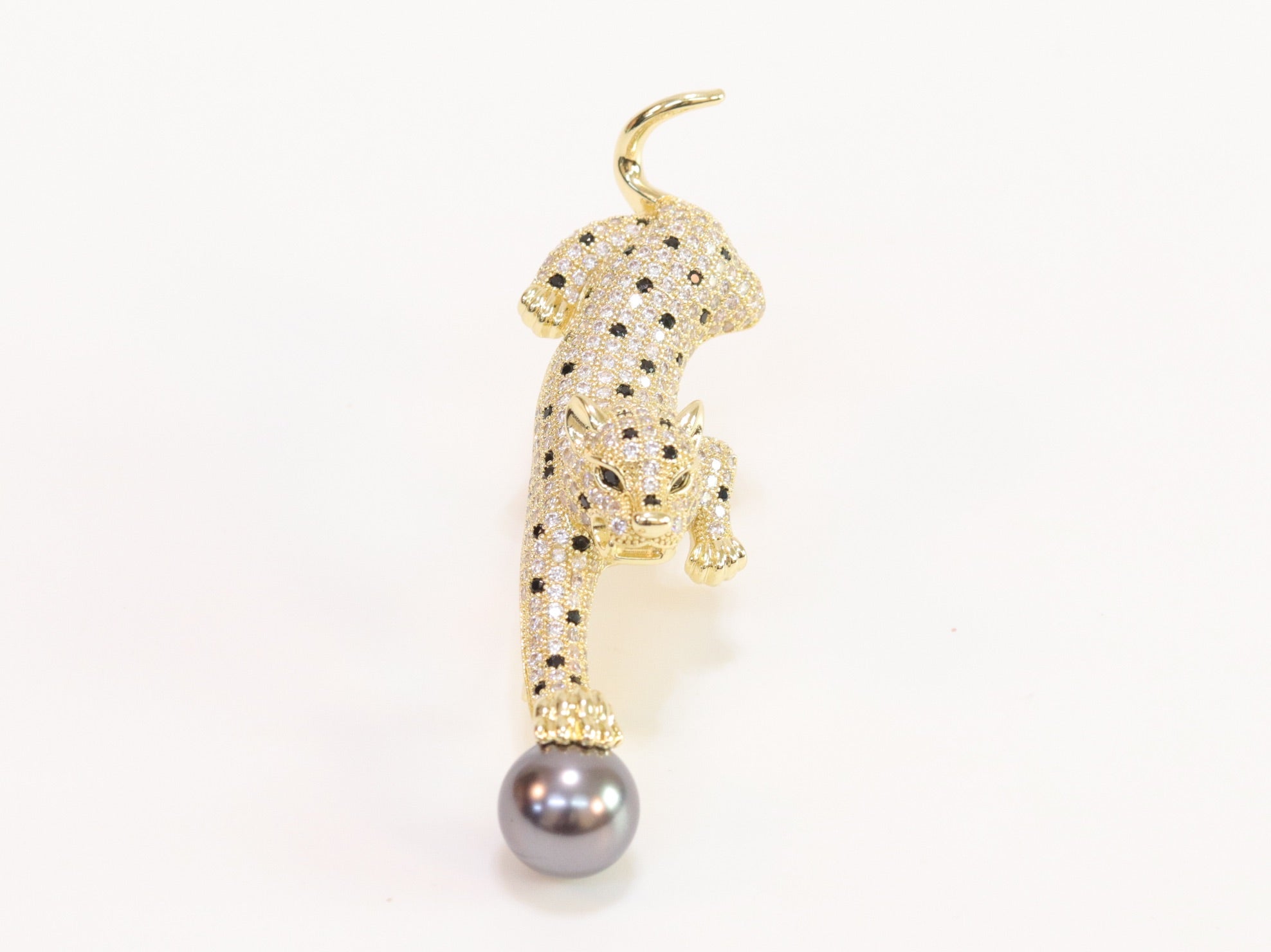 Gold panther with grey pearl and cz brooch