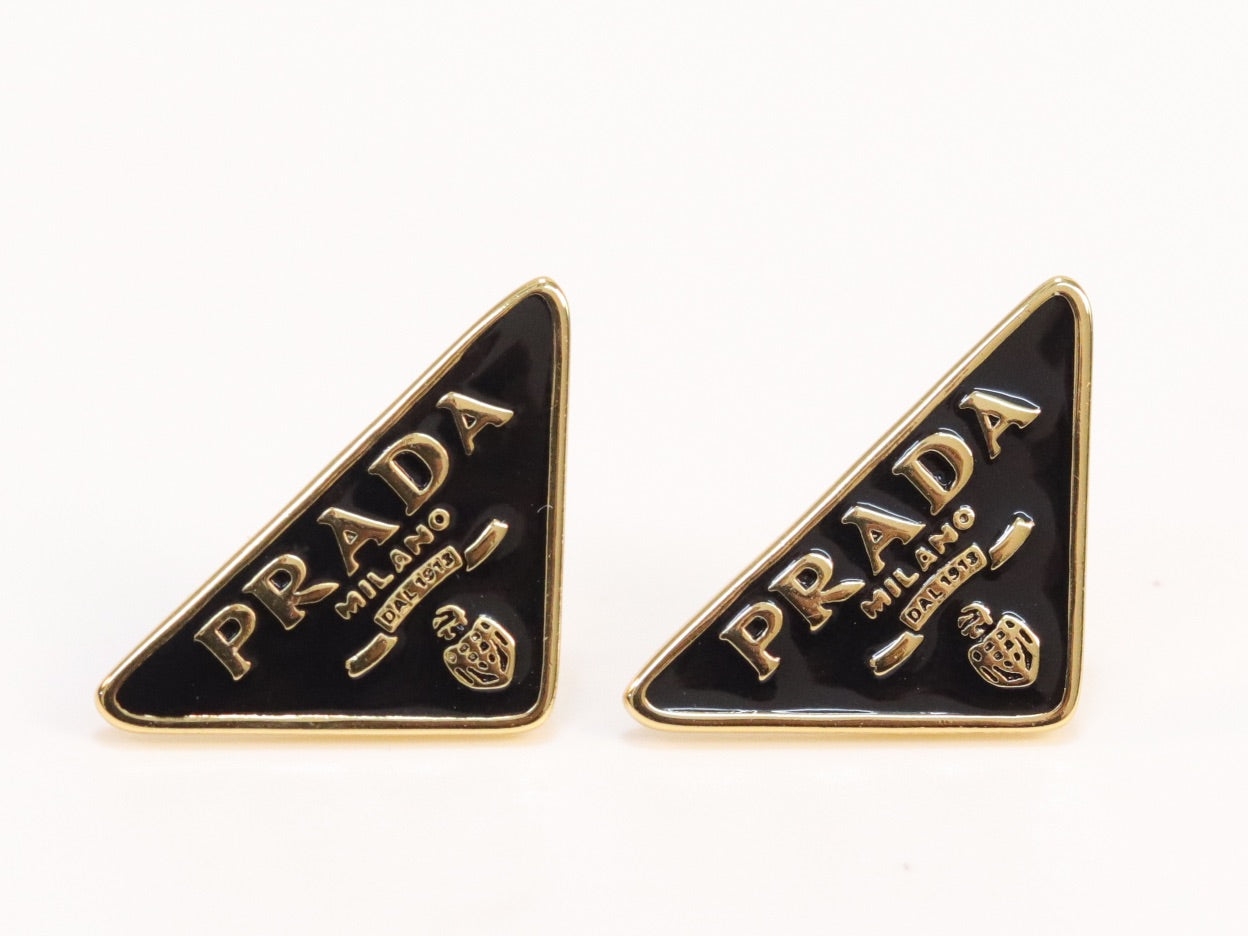 Black & gold enamel studs