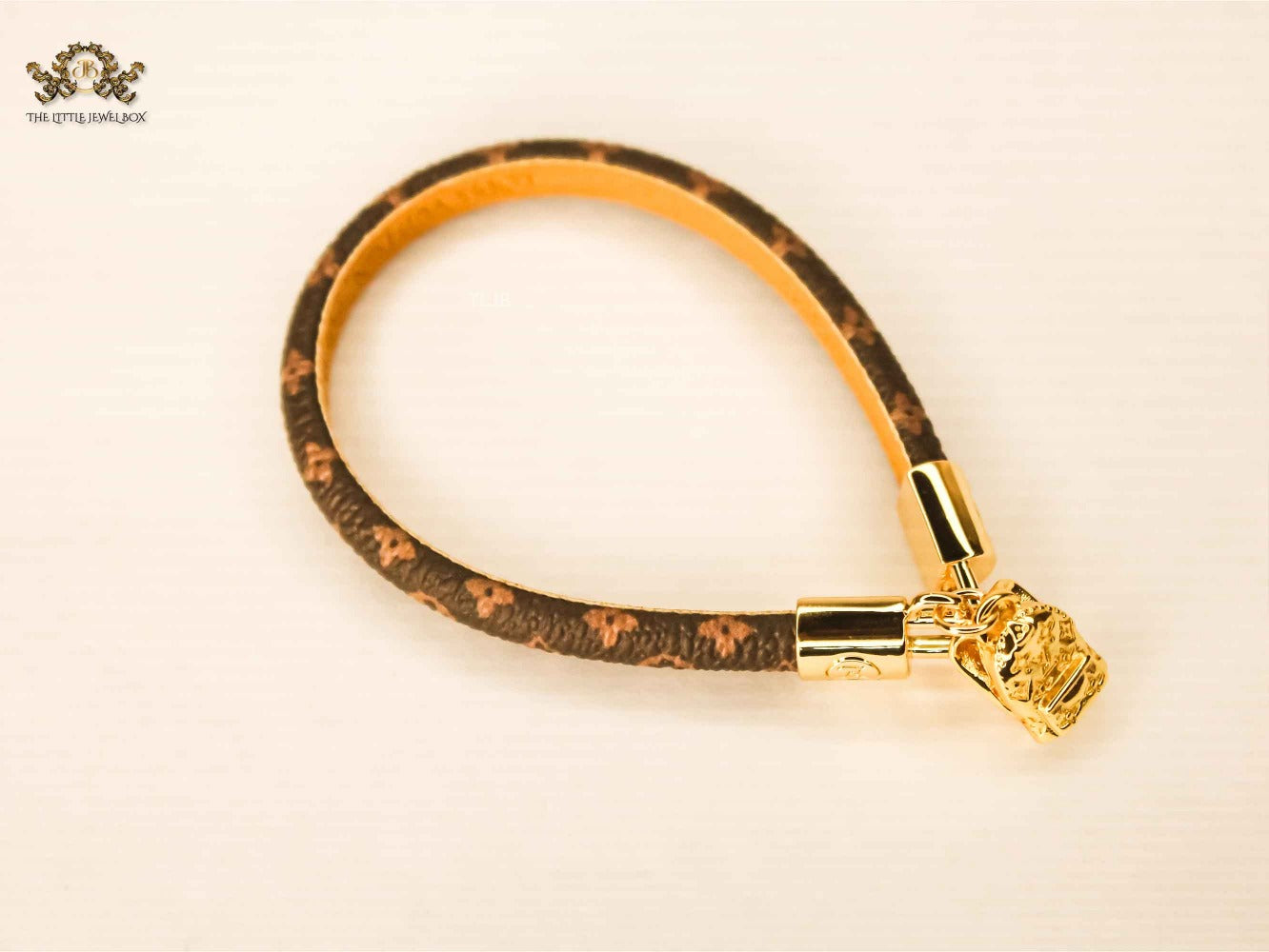 Alphabet L&V golden bag charm monogram leather bracelet