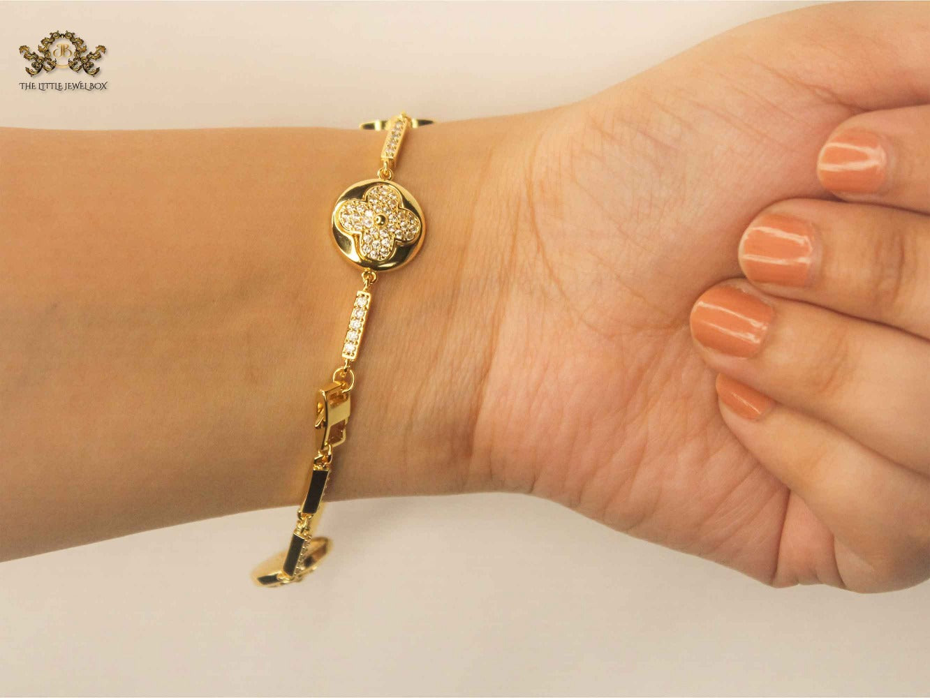 Alphabet L & V gold dazzle bracelet