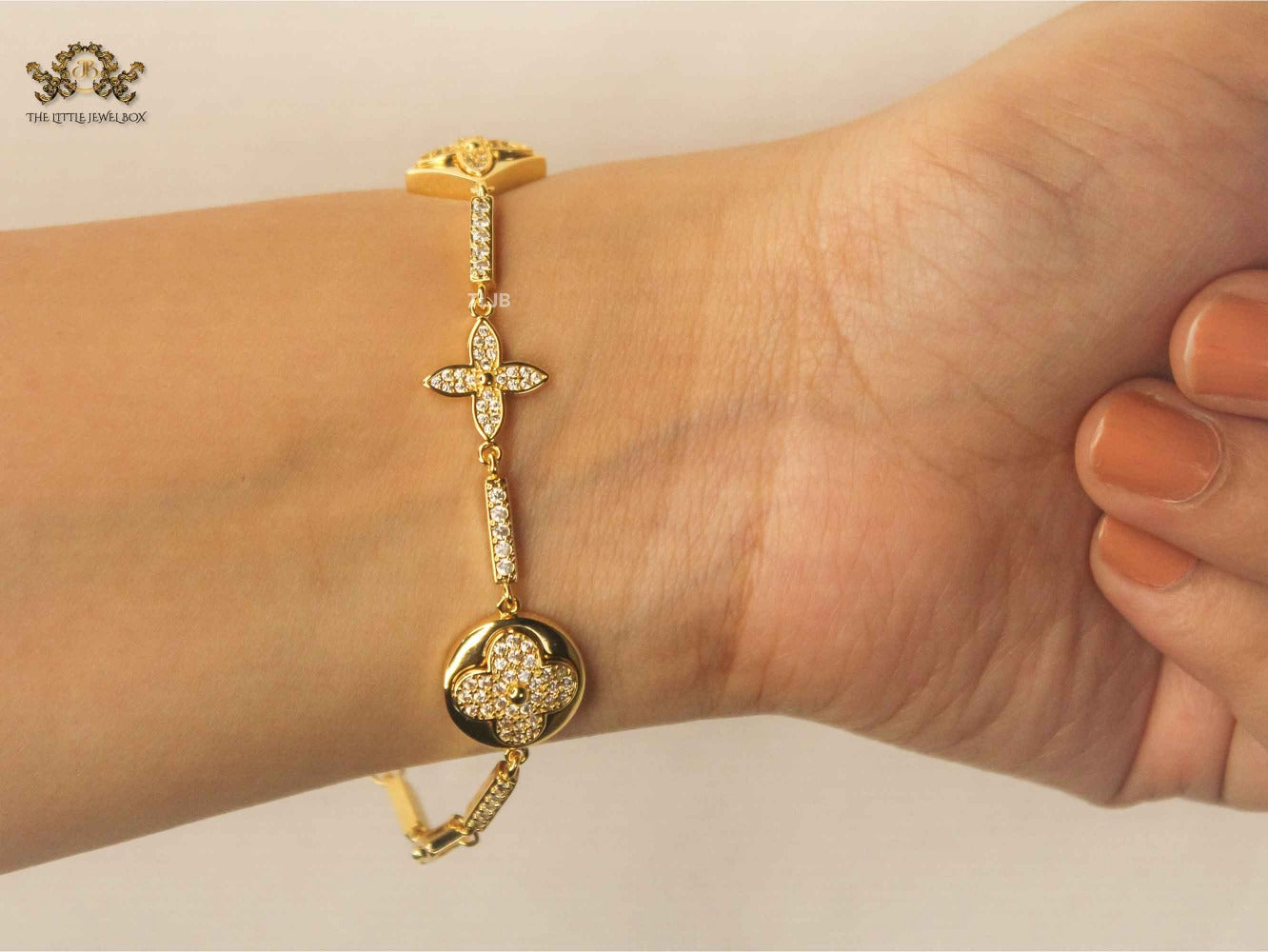 Alphabet L & V gold dazzle bracelet