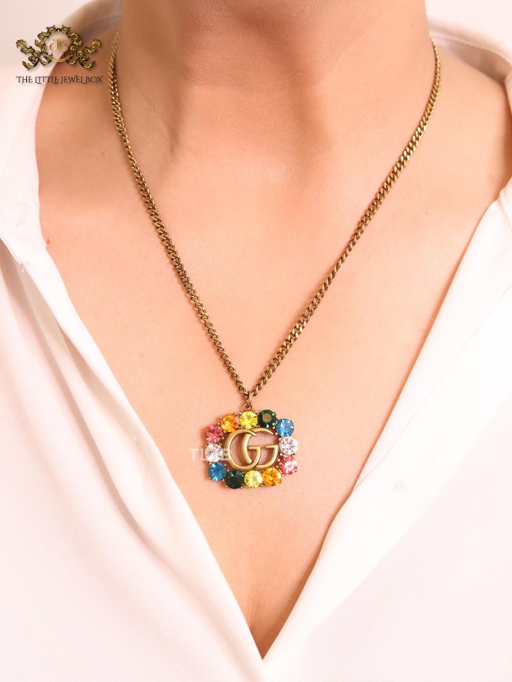 Rustic double g with multicoloured stones