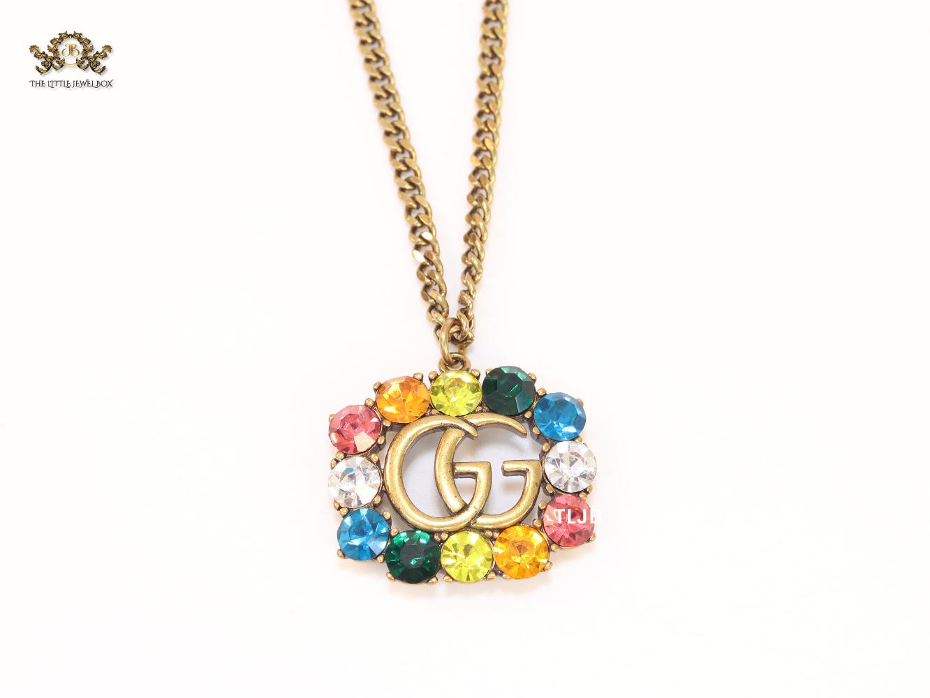 Rustic double g with multicoloured stones
