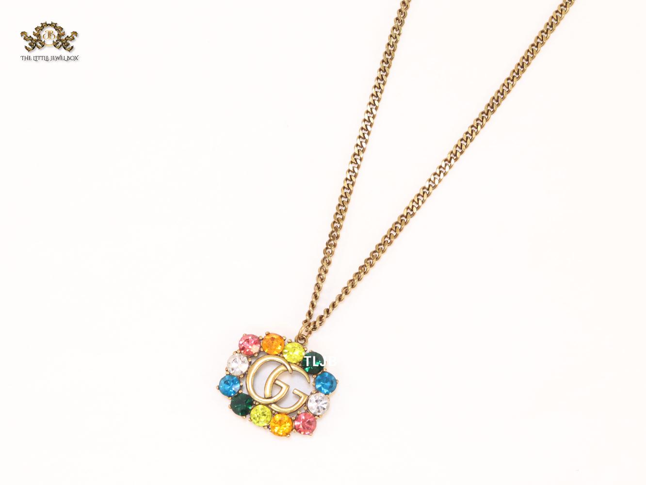 Rustic double g with multicoloured stones