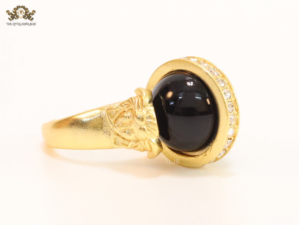 Double gold Medusa with CZ on black ball ring