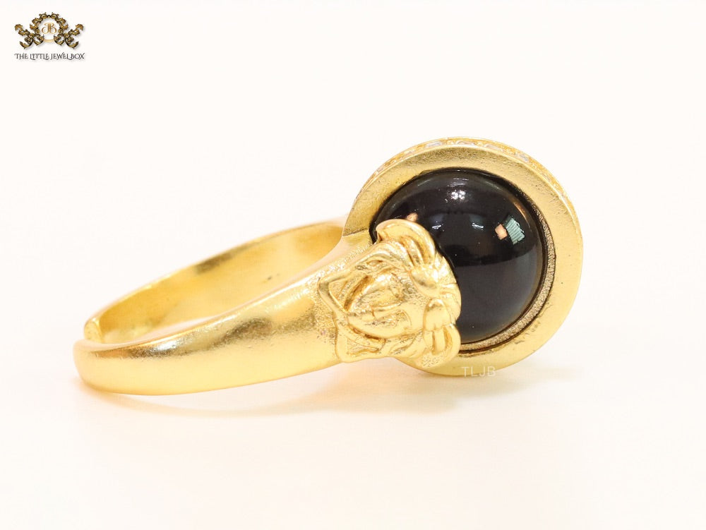 Double gold Medusa with CZ on black ball ring