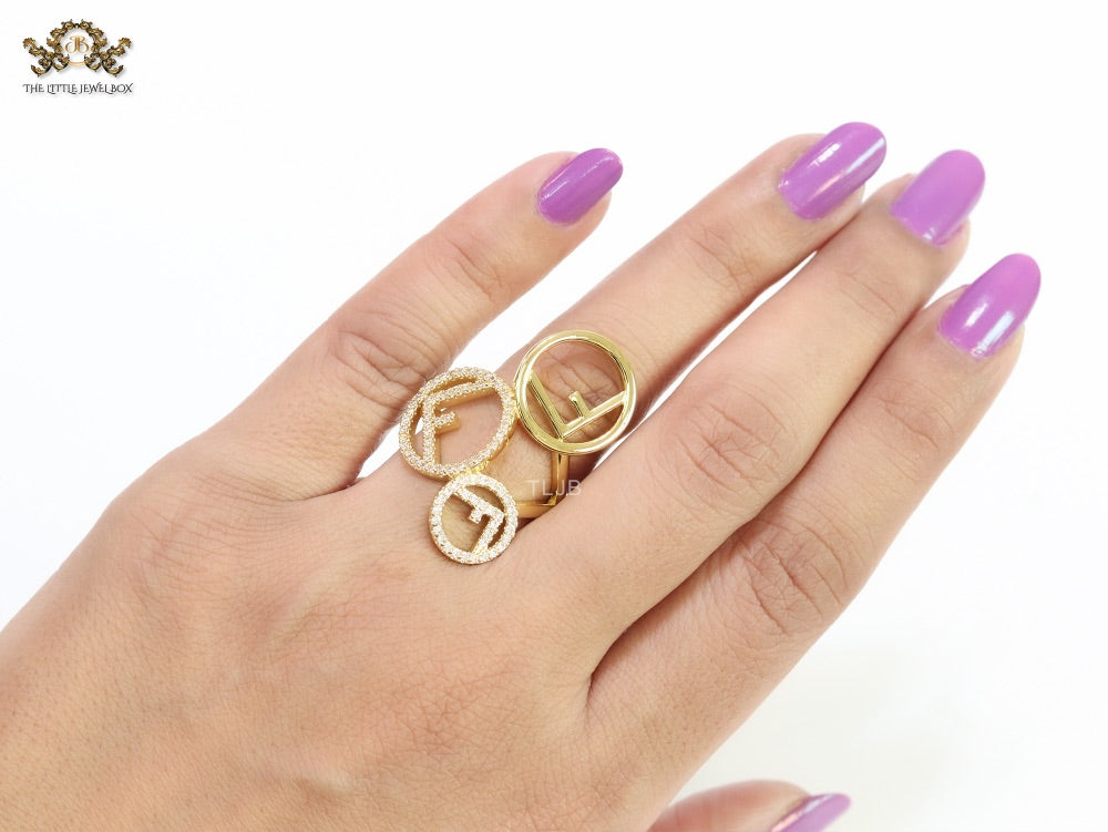 Triple F on a ring with CZ gold plated ring