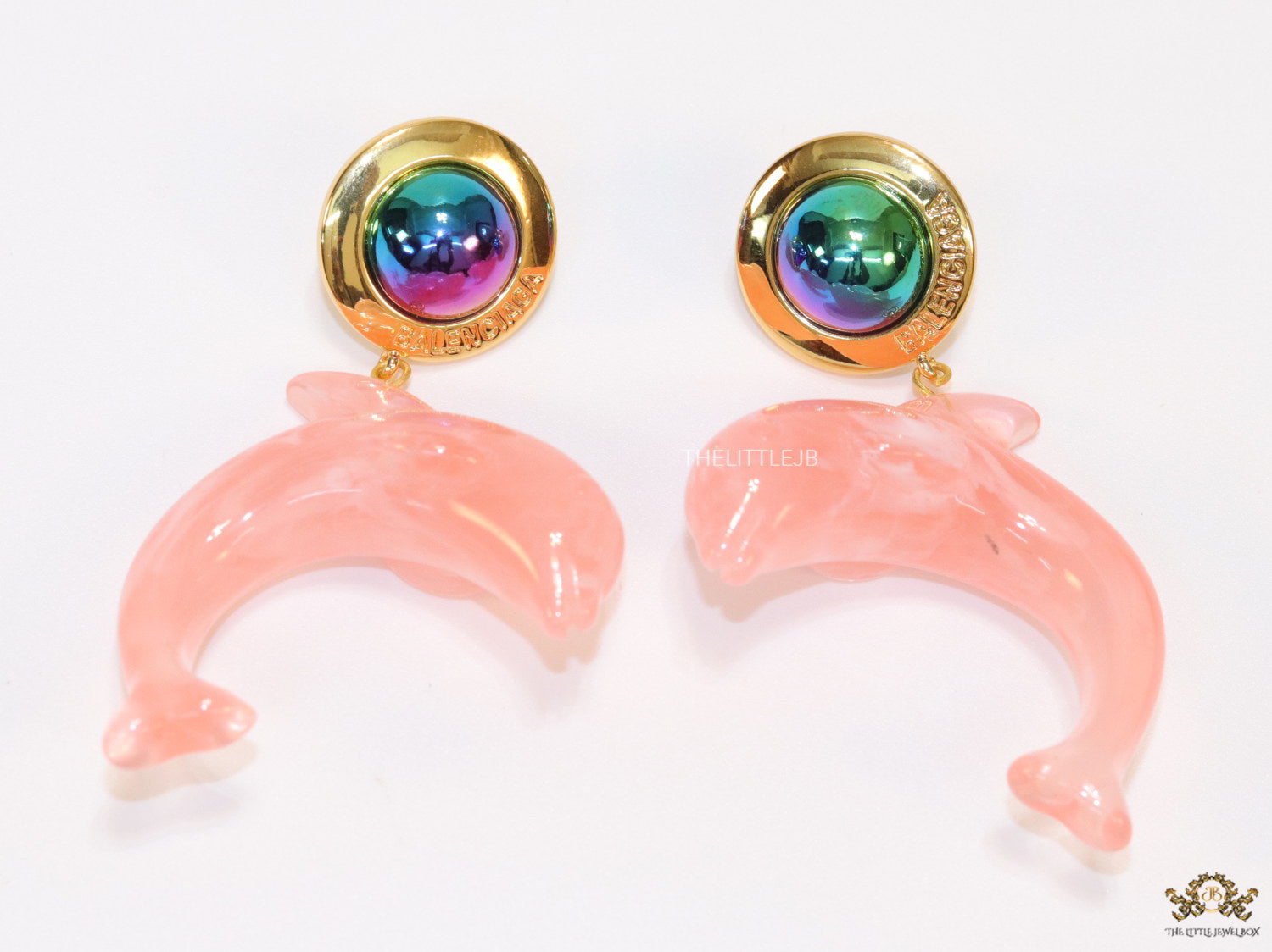 Pink dolphin earring with metallic shade stone