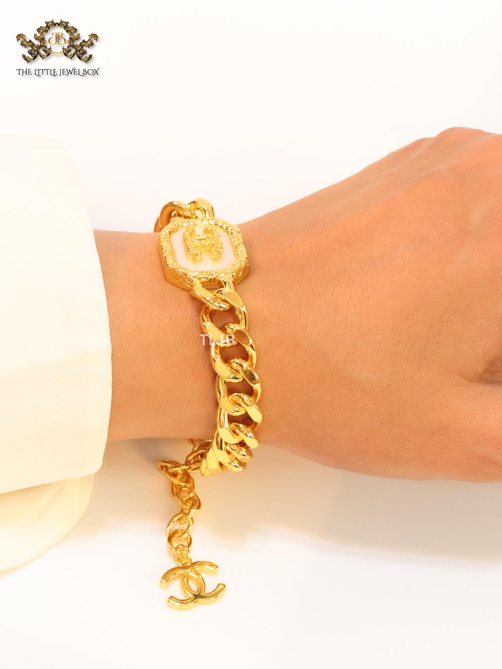 Double C white enamel and  gold link bracelet
