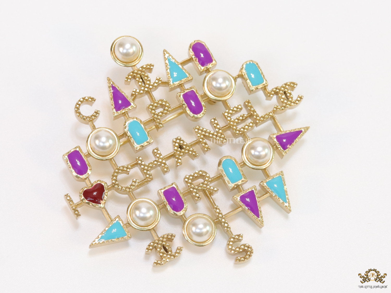 Multicoloured cz and pearls brooch in gold plating