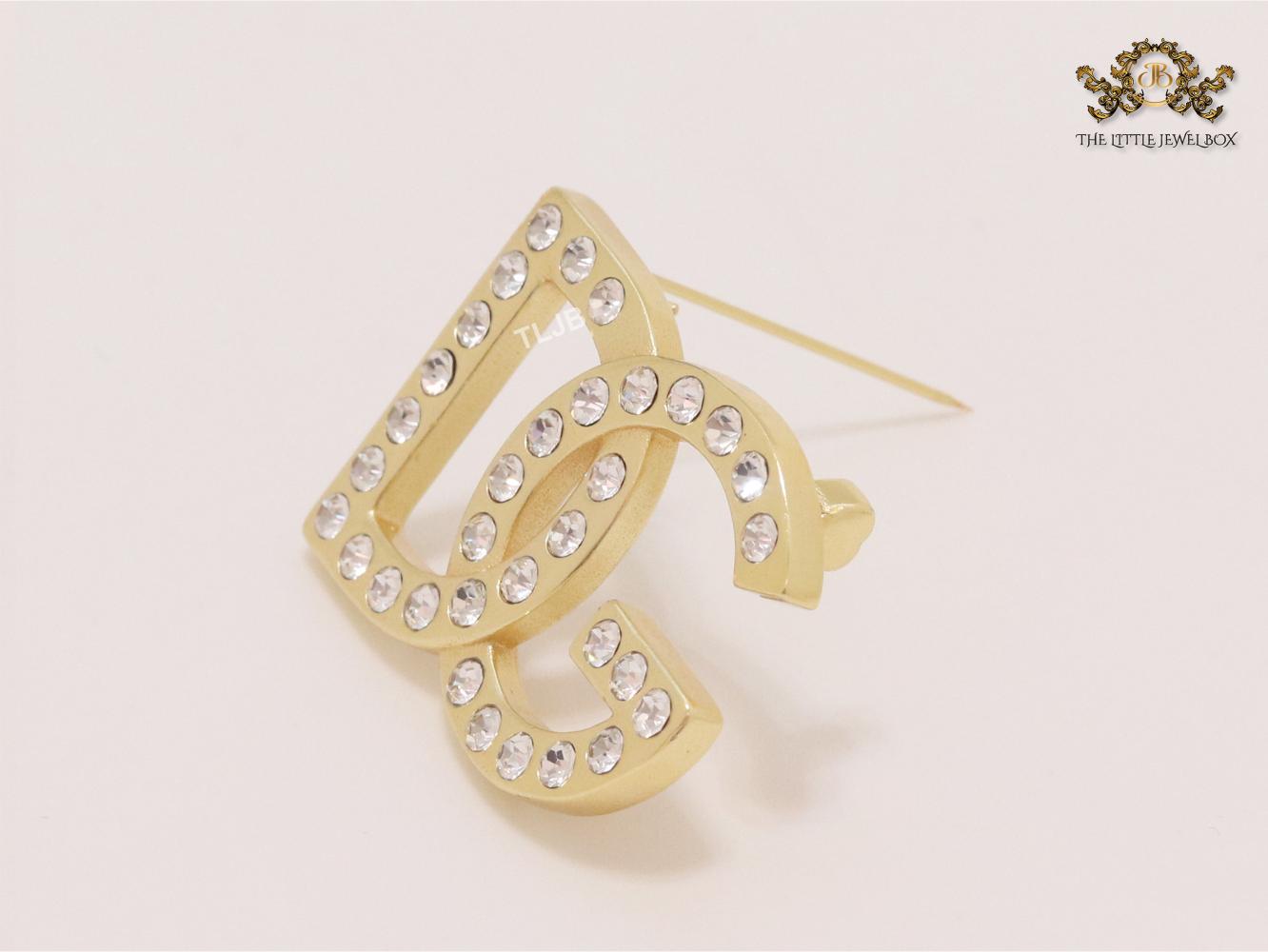 Alphabet DG Matt gold brooch with zircons