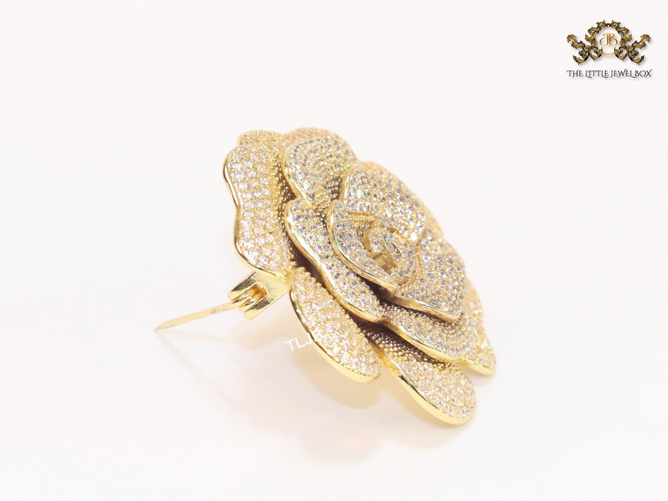 Double C gold & cz flower brooch