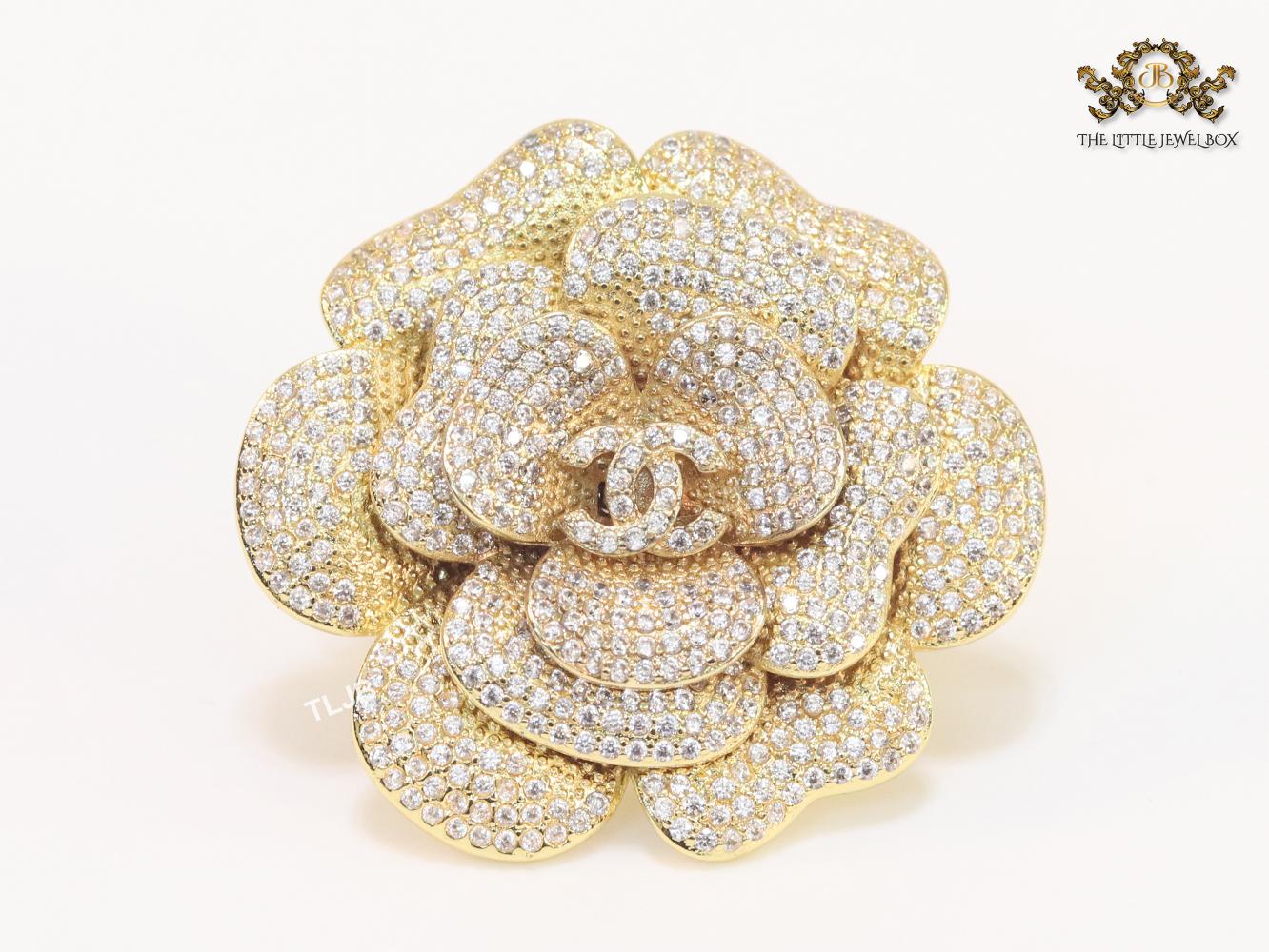 Double C gold & cz flower brooch
