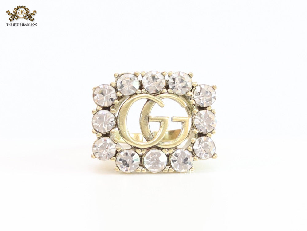 Double G gold plated CZ border ring