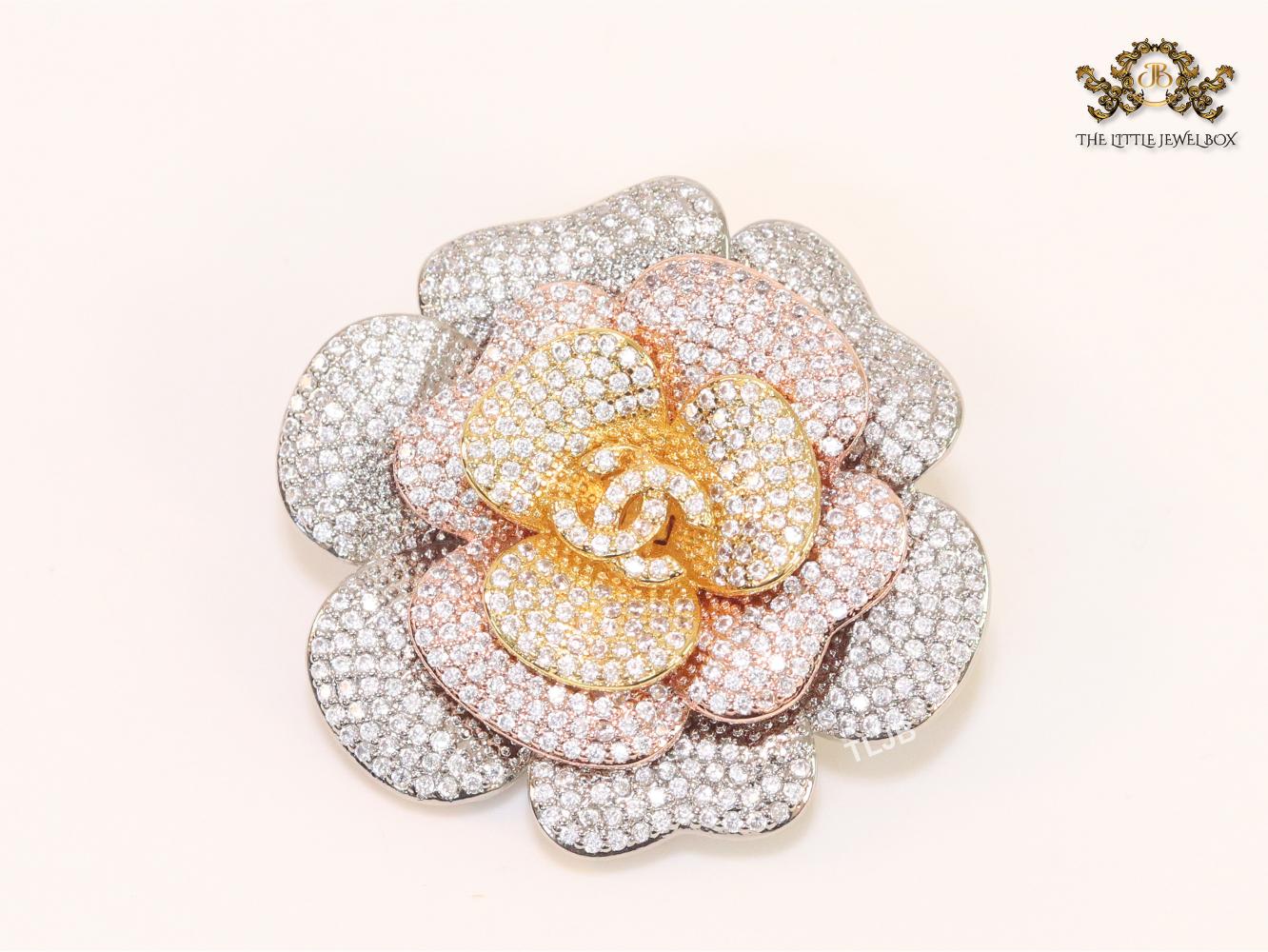 Double C platinum cz brooch with pink coloured details