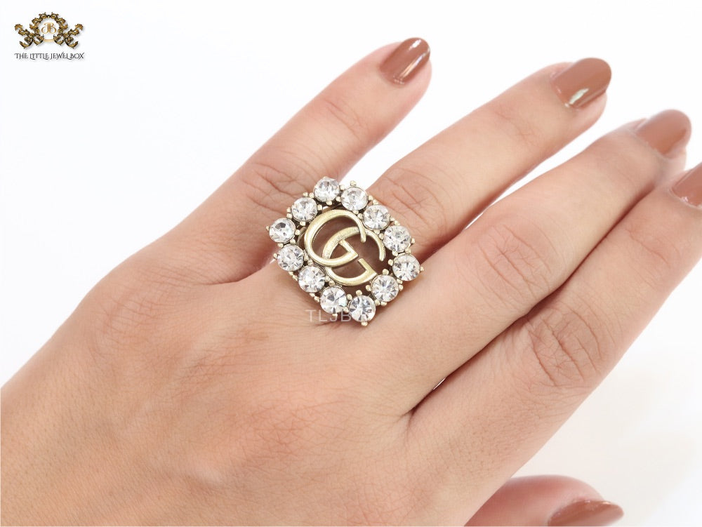 Double G gold plated CZ border ring