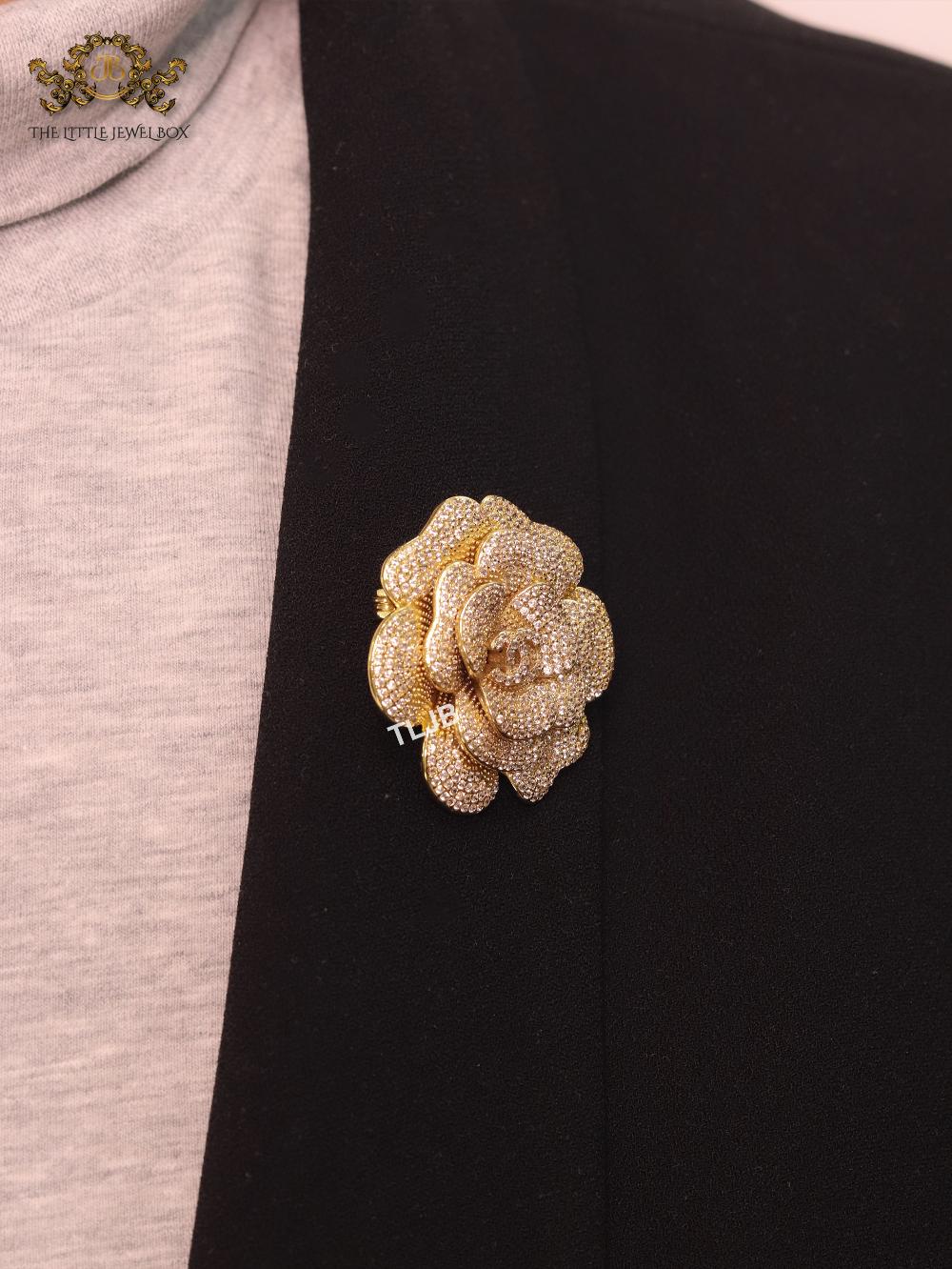 Double C gold & cz flower brooch