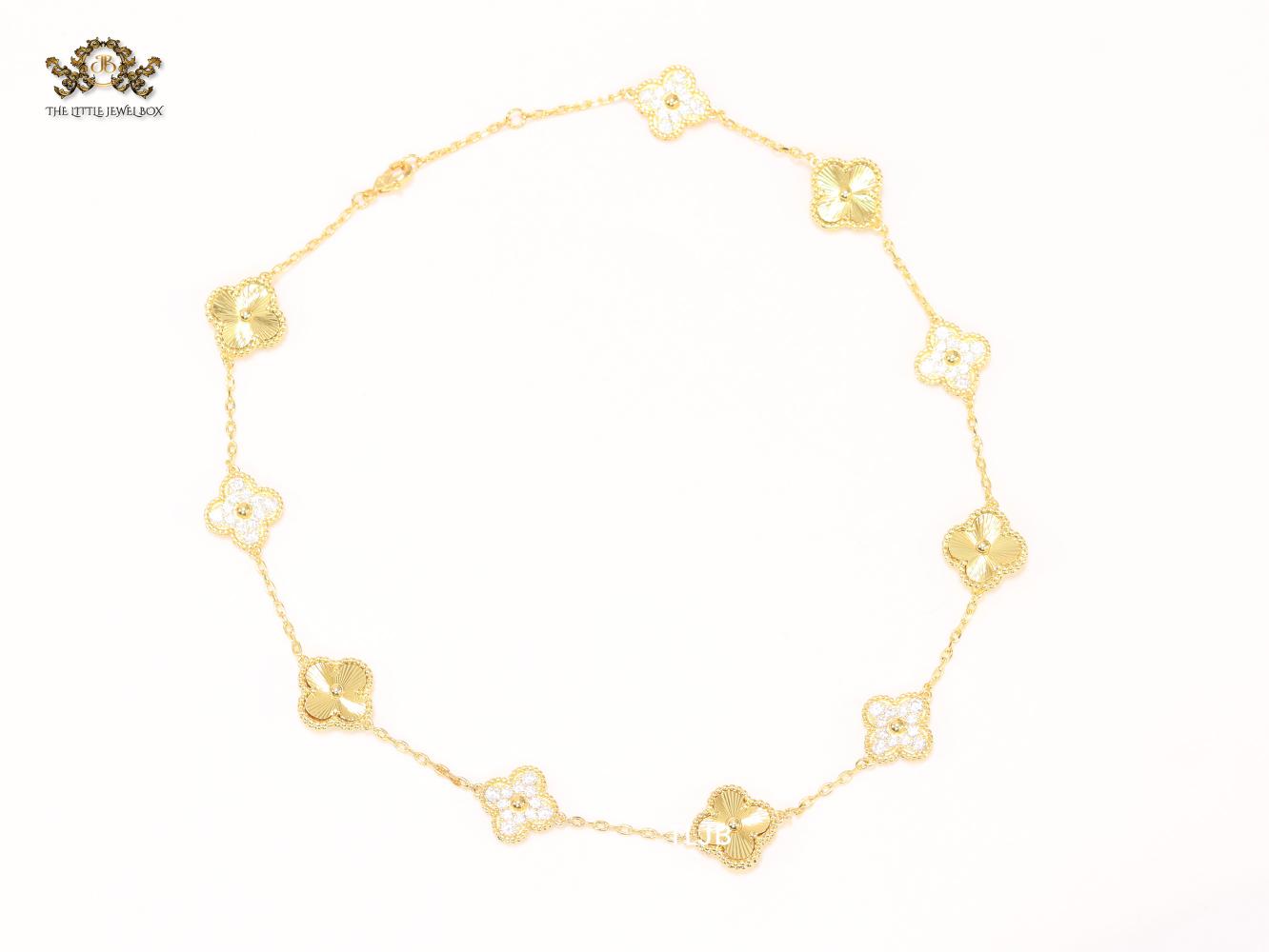 Gold clover and cz sleek chain
