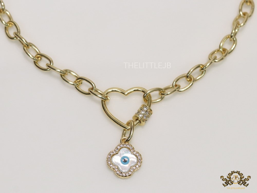 Gold plated link chain necklace with heart shaped lock and evil eye clover pendant