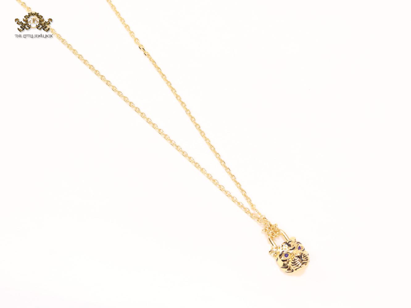 Sleek panther face gold chain