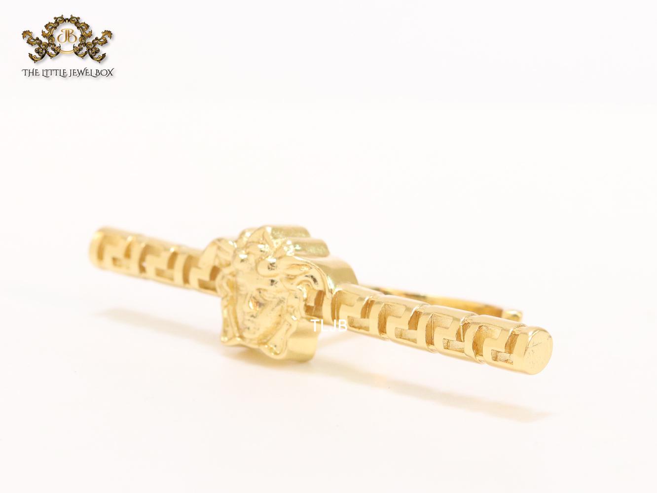 Gold plated embossed medusa statement ring