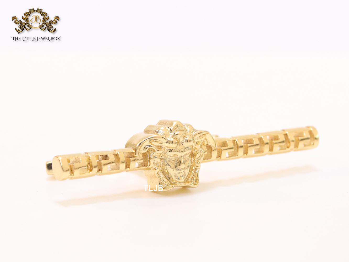 Gold plated embossed medusa statement ring