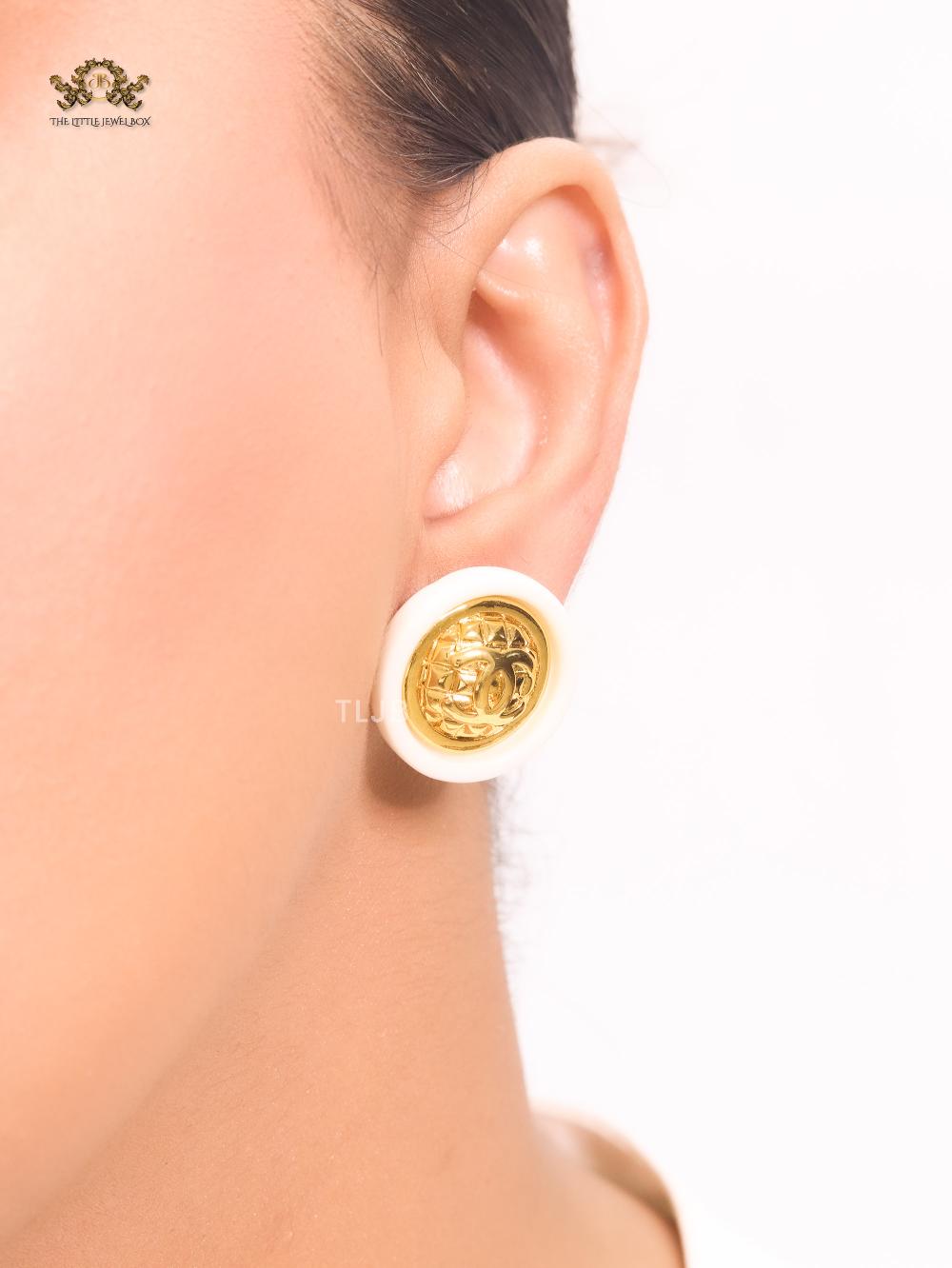 Double C gold and white enamel studs