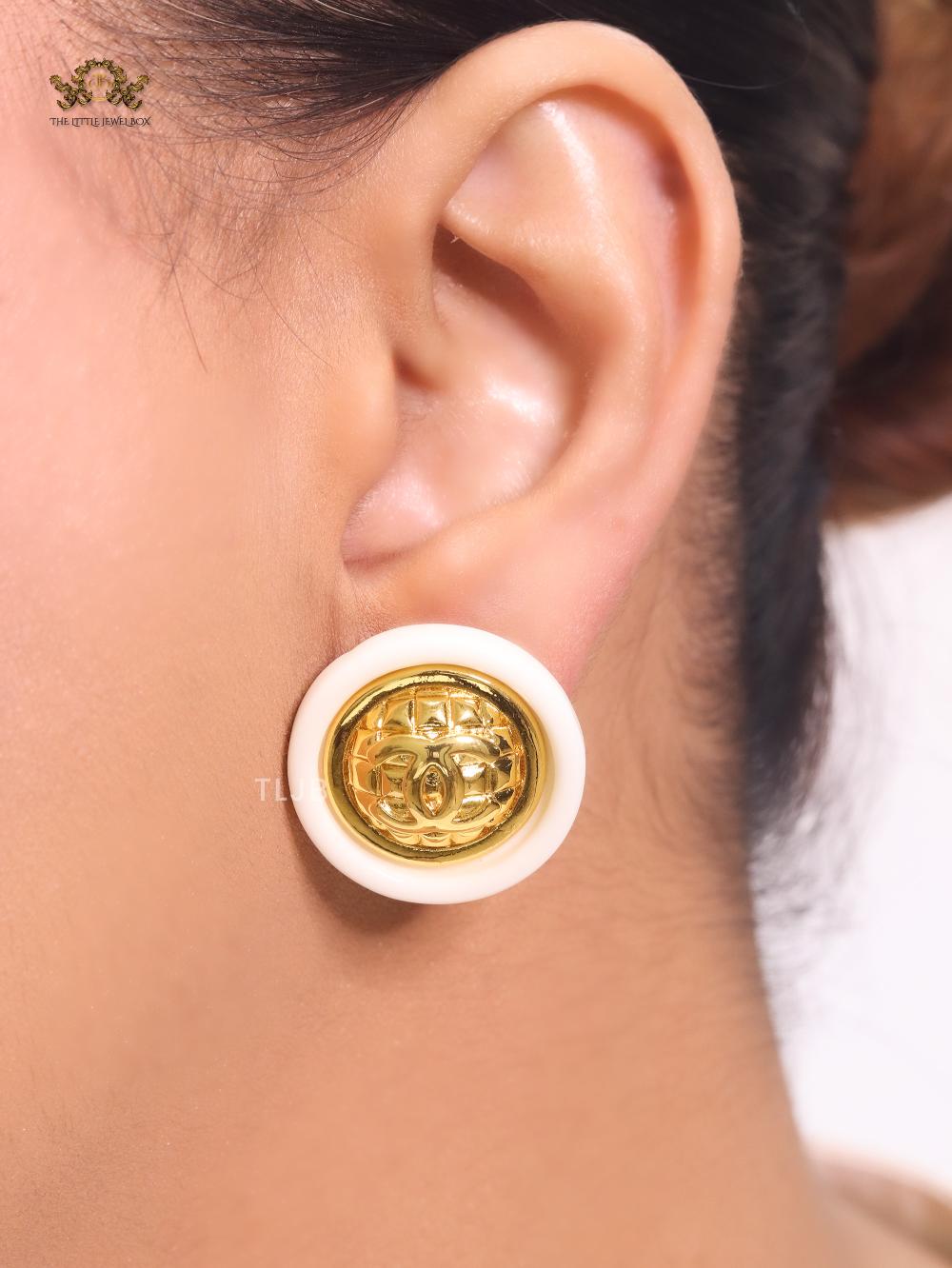 Double C gold and white enamel studs