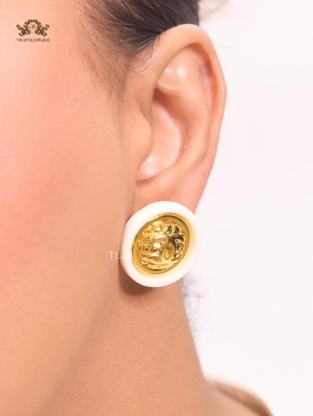 Double C gold and white enamel studs