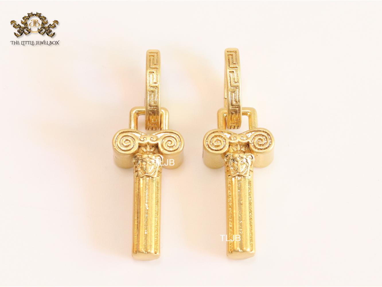 Medusa embossed gold key hoops