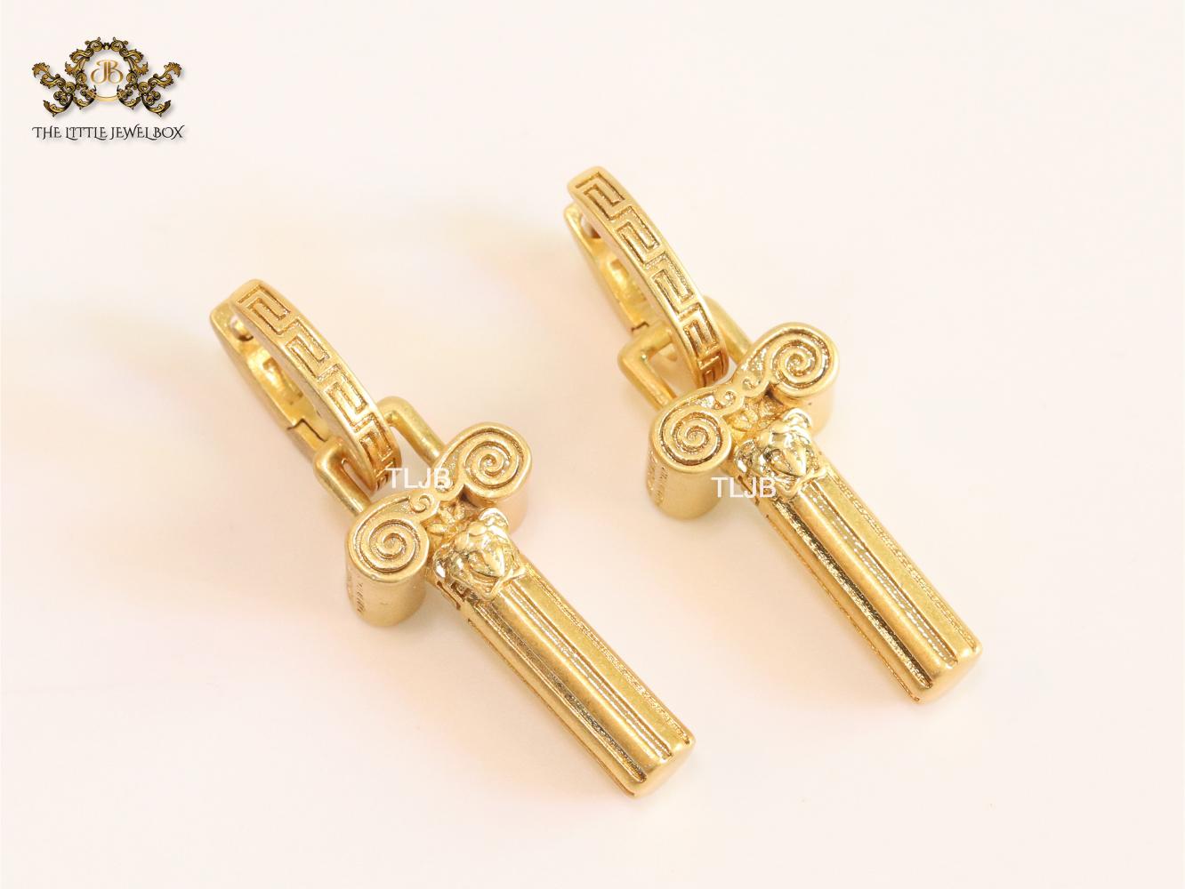 Medusa embossed gold key hoops