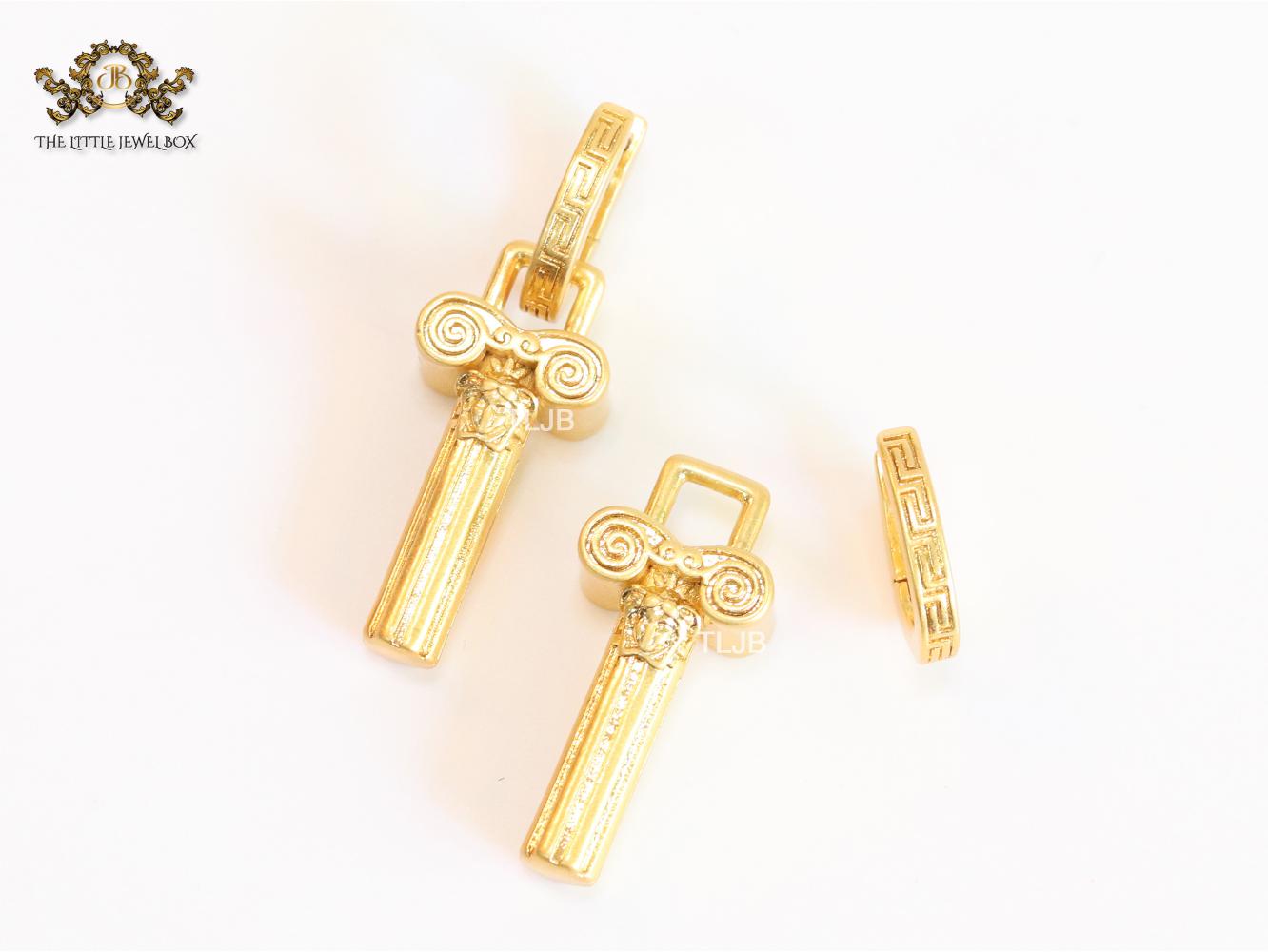 Medusa embossed gold key hoops