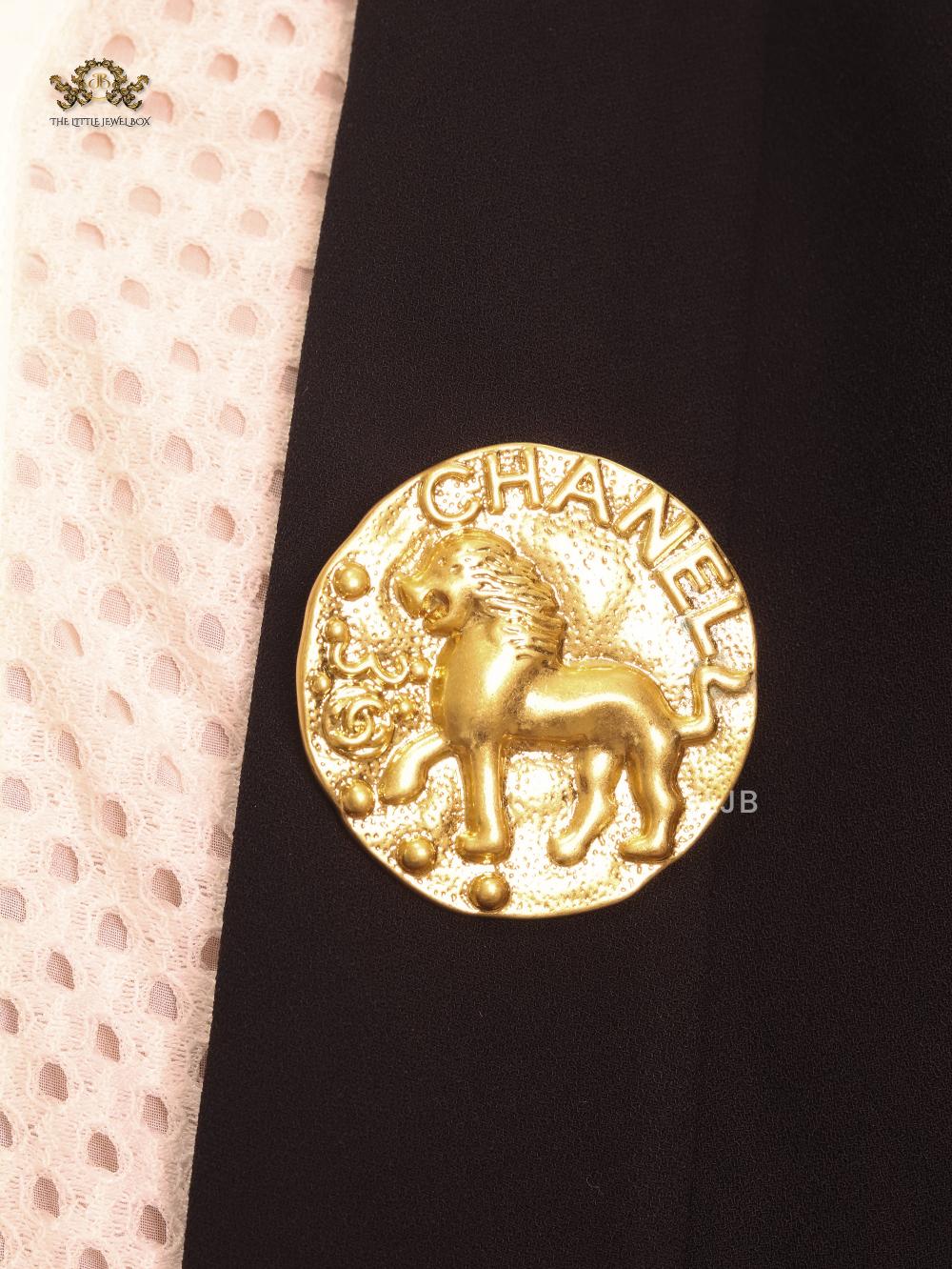 Double C embossed brooch