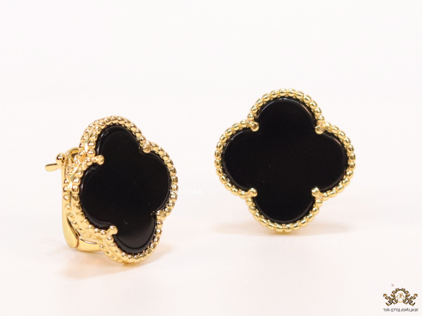 Black clover stud earrings in gold plating