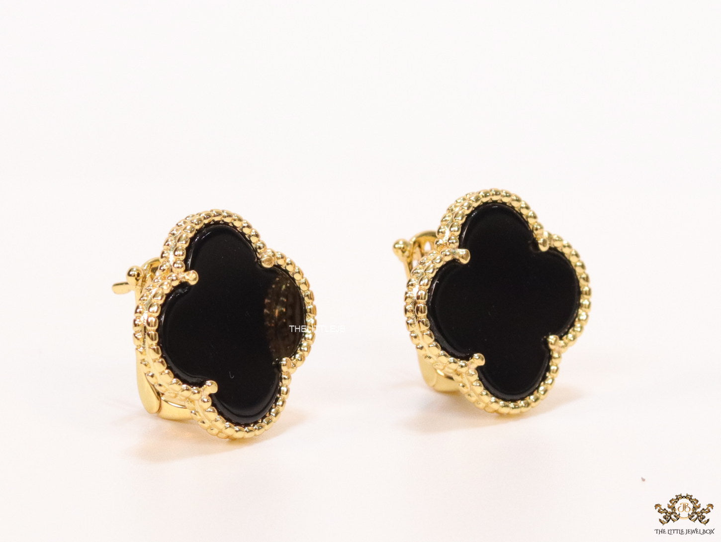 Black clover stud earrings in gold plating