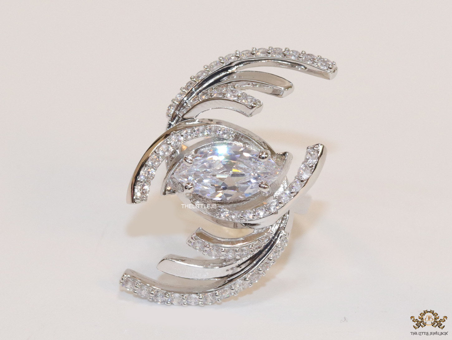 Adjustable designer platinum plated cz ring
