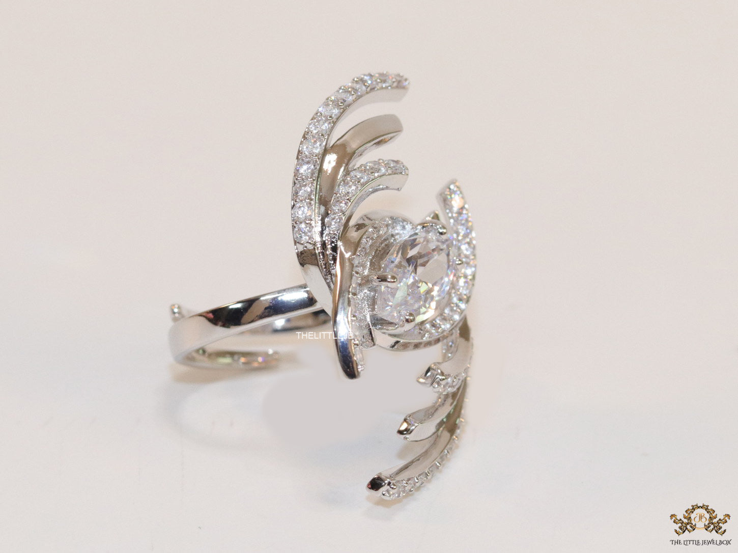 Adjustable designer platinum plated cz ring