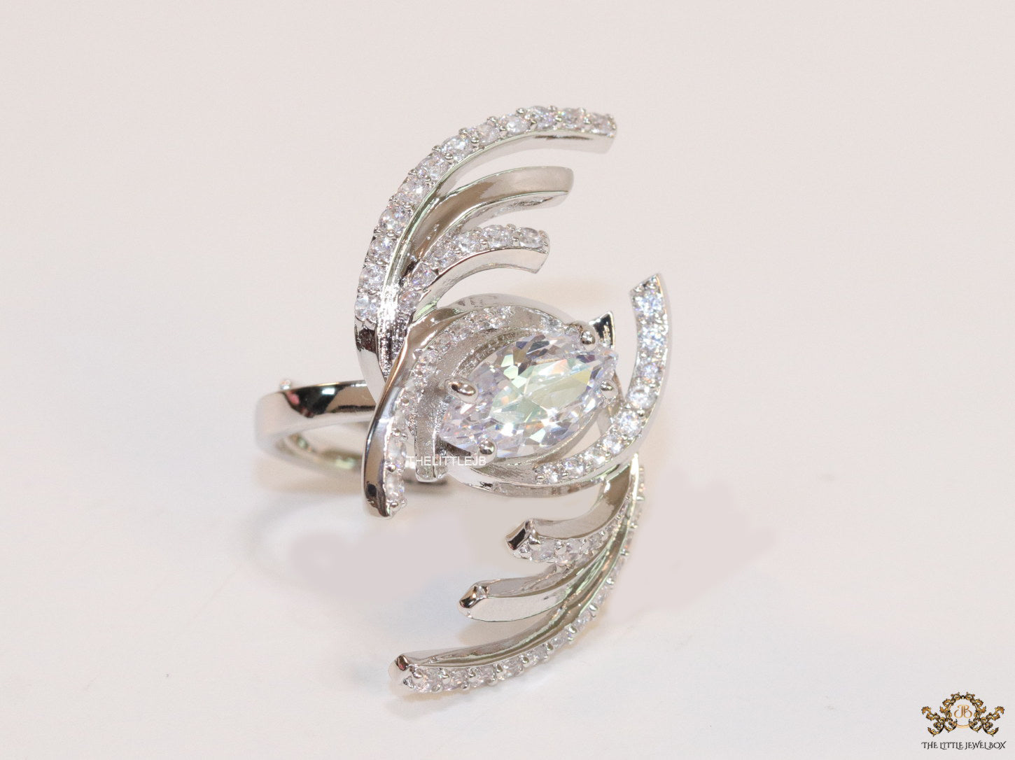 Adjustable designer platinum plated cz ring