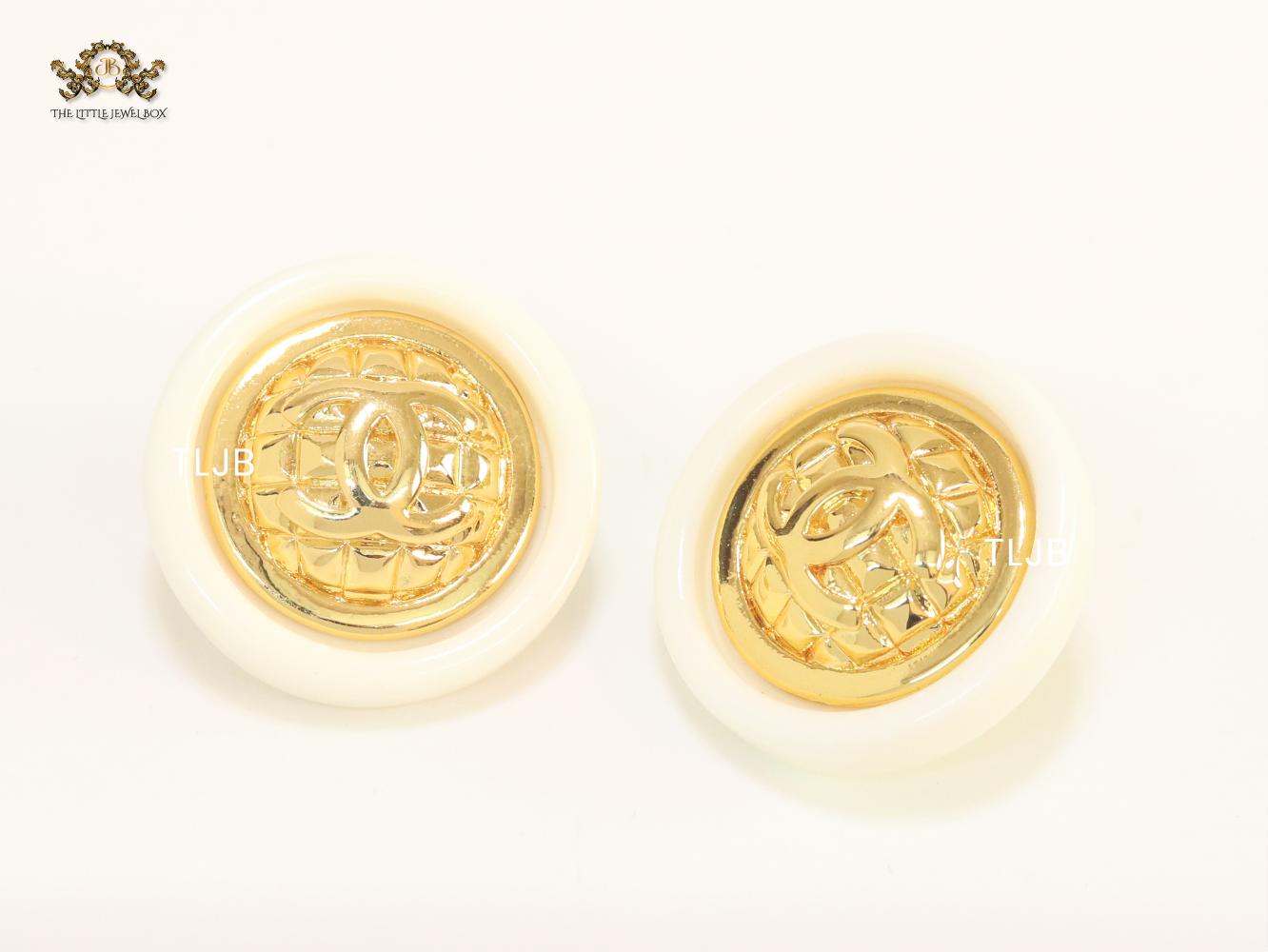 Double C gold and white enamel studs
